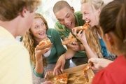 depositphotos_4782302-stock-photo-group-of-teenagers-eating-pizza